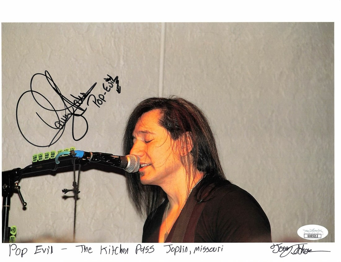 Dave Grahs Autographed 8.5x11 Photo Pop Evil JSA Certified: Dave Grahs Autographed 8.5x11 Photo Pop Evil JSA Certified This professionally printed 8.5x11 cardstock photograph features the signature of Dave Grahs from the rock band Pop Evil. Accompanying his au