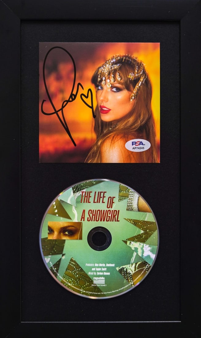 Framed Taylor Swift Signed CD Cover PSA/DNA The Life of a Showgirl: Framed Taylor Swift Signed CD Cover PSA/DNA The Life of a Showgirl This framed CD album cover features the signature of Taylor Swift, authenticated by PSA/DNA, ensuring its authenticity. The cover is 