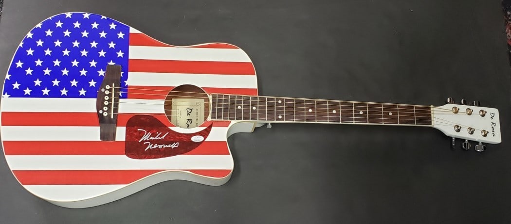 Mike Nesmith Autographed Acoustic Guitar JSA Certified: Mike Nesmith Autographed Acoustic Guitar JSA Certified This is a pre-owned acoustic guitar autographed by Mike Nesmith of The Monkees. The signature has been authenticated by James Spence Authenticati
