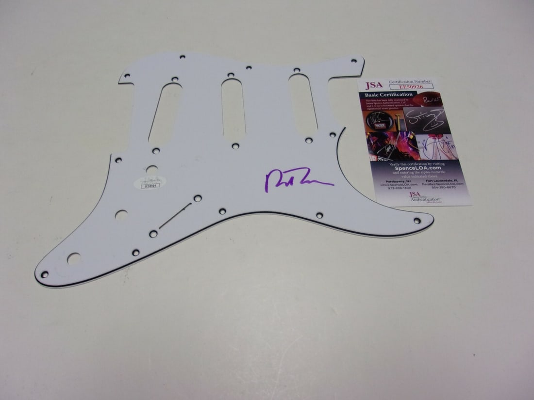 Richard Thompson Signed Guitar Pickguard with JSA COA Fairport Convention: Richard Thompson Signed Guitar Pickguard with JSA COA Fairport Convention This guitar pick guard is signed by Richard Thompson, the frontman of Fairport Convention. It is an original item from the Uni