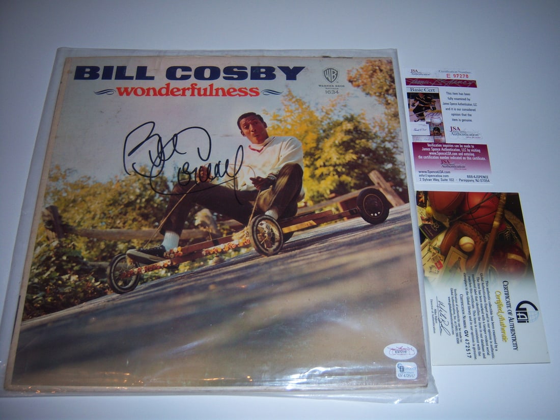Bill Cosby Wonderfulness signed vinyl album JSA COA: Bill Cosby Wonderfulness signed vinyl album JSA COA This is an original 'Wonderfulness' vinyl record album by Bill Cosby, signed as indicated in the title. The album is pre-owned and originates from t