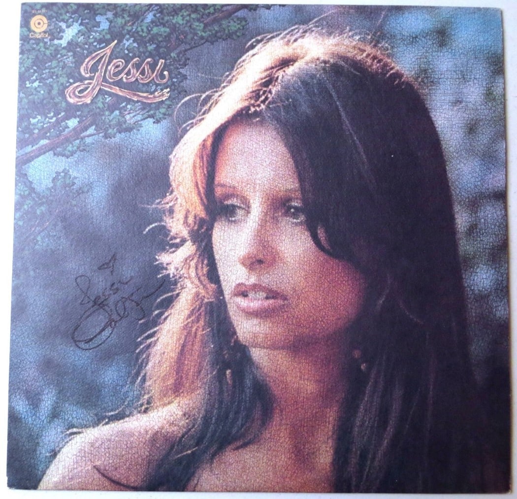 Jessi Colter Album Cover with JSA Authenticated Signature: Jessi Colter Album Cover with JSA Authenticated Signature This is an original record album cover autographed by Jessi Colter. The autograph has been authenticated by James Spence Authentication (JSA).