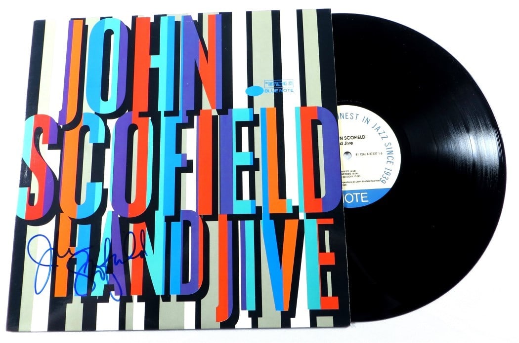 John Scofield Hand Jive Signed Album Cover JSA Authenticated: John Scofield Hand Jive Signed Album Cover JSA Authenticated This is an original autographed record album cover by renowned jazz guitarist John Scofield, featuring the album 'Hand Jive'. The