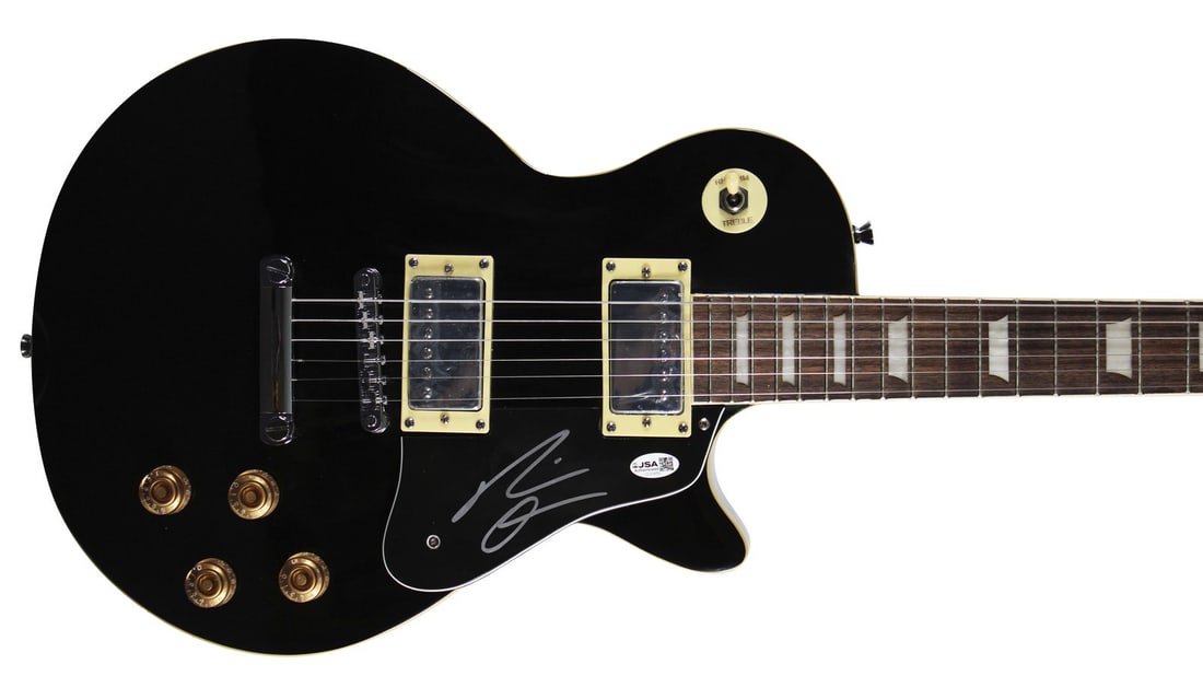 Gavin Adcock Autographed Glen Burton Les Paul Electric Guitar JSA Authenticated: Gavin Adcock Autographed Glen Burton Les Paul Electric Guitar JSA Authenticated This Glen Burton Les Paul black electric guitar has been personally signed by Gavin Adcock. The autograph is authenticat
