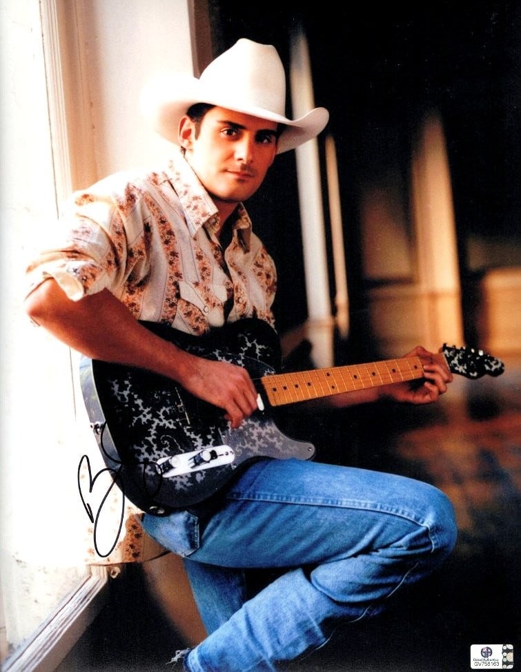 Brad Paisley Authentic Signed 11X14 Photo with Guitar Global Authentics: Brad Paisley Authentic Signed 11X14 Photo with Guitar Global Authentics This is an original 11x14 photo featuring Brad Paisley, signed by the artist. The autograph is authenticated by Global Authentic
