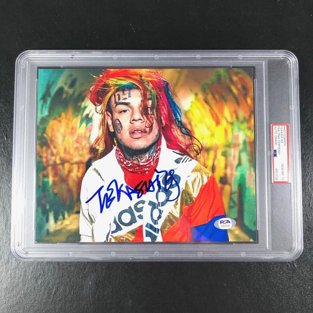 Tekashi69 autographed 8x10 photo PSA DNA grade 10: Tekashi69 autographed 8x10 photo PSA DNA grade 10 This is a professionally printed 8x10 photo featuring an authentic autograph by rapper Tekashi69. The signed photo has been encapsulated and the autog