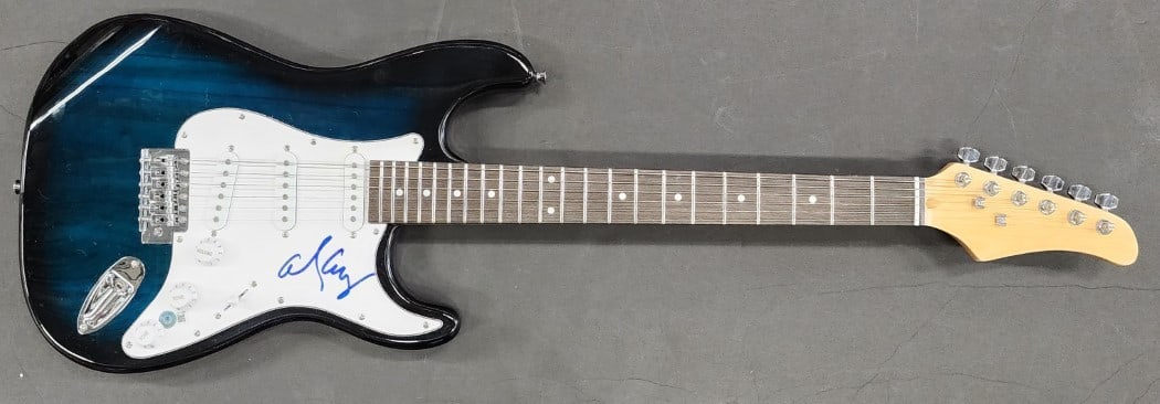 Alice Cooper Signed Electric Guitar with Beckett Authentication: Alice Cooper Signed Electric Guitar with Beckett Authentication This authentic electric guitar features the signature of the legendary rock musician Alice Cooper, adding a unique touch to any collecti