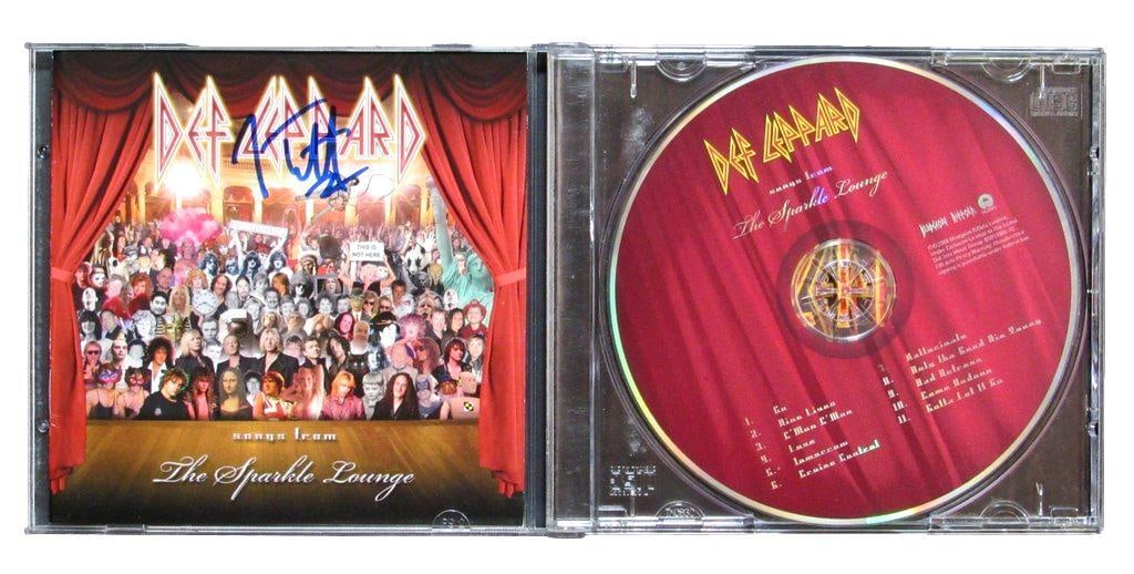 Joe Elliott Signed CD Cover Def Leppard Songs From The Sparkle Lounge JSA: Joe Elliott Signed CD Cover Def Leppard Songs From The Sparkle Lounge JSA This is an original autographed CD cover of "Songs From The Sparkle Lounge" by Joe Elliott, the lead singer of Def Leppard. Th