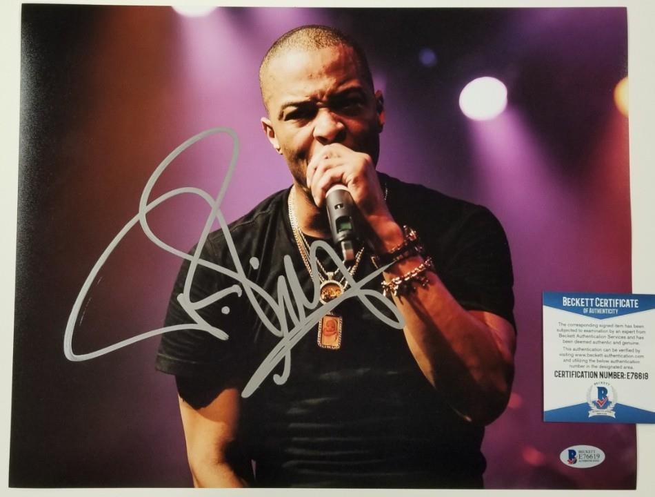 11x14 Autographed T.I. Photo with Beckett BAS Authentication: 11x14 Autographed T.I. Photo with Beckett BAS Authentication This is an original 11x14 photograph signed by T.I. Clifford Harris Jr., renowned hip hop artist and rapper. The autograph is authenticated