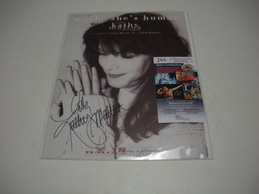 Signed Maybe She's Human Sheet Music by Kathy Mattea JSA COA: Signed Maybe She's Human Sheet Music by Kathy Mattea JSA COA This listing features original sheet music for the song "Maybe She's Human" by Kathy Mattea, hand-signed by the artist. The item comes with
