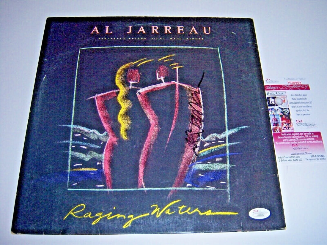 Signed Al Jarreau Raging Waters LP Record with JSA COA: Signed Al Jarreau Raging Waters LP Record with JSA COA This is an original Al Jarreau "Raging Waters" LP record album, signed by Al Jarreau. The album features a colorful abstract cover design and is 