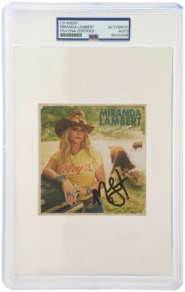 Miranda Lambert Signed Postcards From Texas 5x5 CD Insert PSA/DNA: Miranda Lambert Signed Postcards From Texas 5x5 CD Insert PSA/DNA This is a signed 'Postcards From Texas' 5x5 CD insert card by Miranda Lambert. The item is an original piece, encapsulated and authent