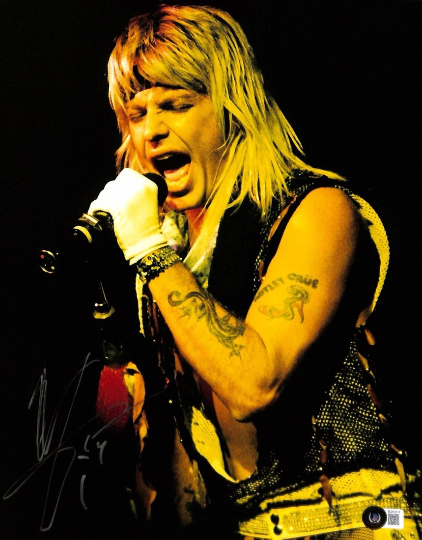 11x14 Photograph Signed by Vince Neil with Beckett Authentication: 11x14 Photograph Signed by Vince Neil with Beckett Authentication This is an original 11x14 photograph autographed by musician Vince Neil of Motley Crue. The signature was obtained in person in 2010 d