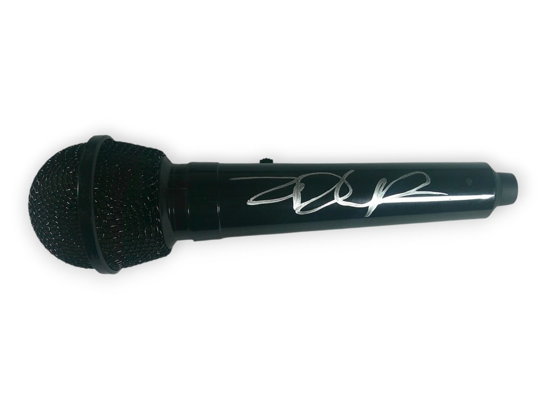 Microphone Signed by Zack de la Rocha with JSA Authentication: Microphone Signed by Zack de la Rocha with JSA Authentication This is an original microphone autographed by Zack de la Rocha, the lead vocalist of Rage Against the Machine. The autograph has been