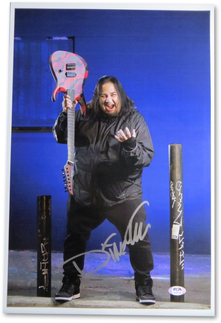 Dino Cazares Autographed 12X18 Photo Fear Factory PSA Certified: Dino Cazares Autographed 12X18 Photo Fear Factory PSA Certified This is a stunning autographed 12X18 photograph of Dino Cazares, the renowned guitarist of the band Fear Factory. The photo is authentic