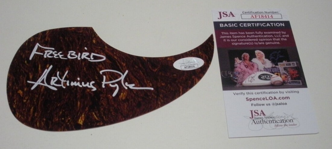 Signed Pick Guard by Artimus Pyle Lynyrd Skynyrd Freebird with JSA COA: Signed Pick Guard by Artimus Pyle Lynyrd Skynyrd Freebird with JSA COA This is an original guitar pick guard signed by Artimus Pyle of Lynyrd Skynyrd. It is a genuine collectible item from the United 