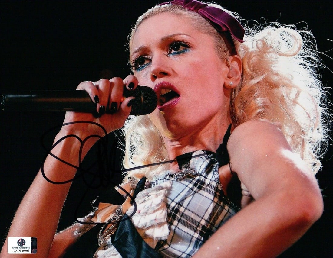 Gwen Stefani Autographed 8x10 Photo No Doubt GAI Certified: Gwen Stefani Autographed 8x10 Photo No Doubt GAI Certified This striking 8x10 photograph features Gwen Stefani, a prominent figure from the band No Doubt, showcasing her signature style. The photo is 