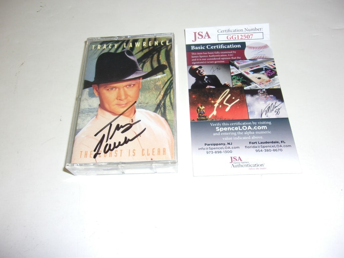 Autographed Tracy Lawrence The Coast Is Clear Cassette With JSA COA: Autographed Tracy Lawrence The Coast Is Clear Cassette With JSA COA This is a pre-owned cassette tape album of "The Coast Is Clear" by Tracy Lawrence. The album has been signed and comes with JSA/COA 