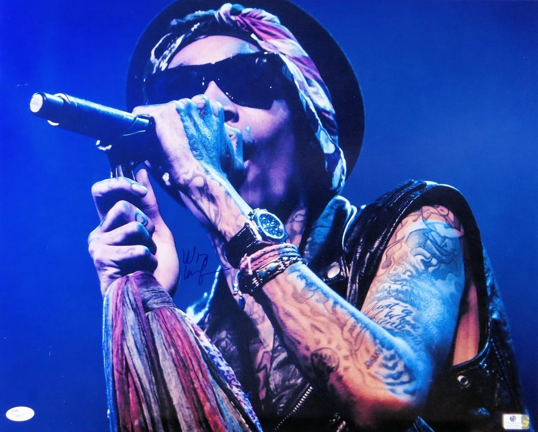 Wiz Khalifa Signed 16X20 Photo Close-Up JSA Certified: Wiz Khalifa Signed 16X20 Photo Close-Up JSA Certified This is a stunning autographed 16X20 photo of Wiz Khalifa, captured in a close-up while singing. This original piece is authenticated by James Spe