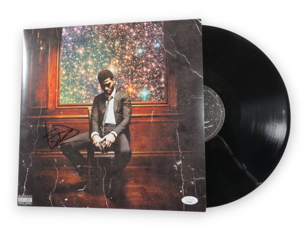 Kid Cudi Autographed Album Cover Man on the Moon II JSA Certified: Kid Cudi Autographed Album Cover Man on the Moon II JSA Certified This is an original Kid Cudi signed autograph record album cover from 'Man on the Moon II'. The album cover features the artist's auth