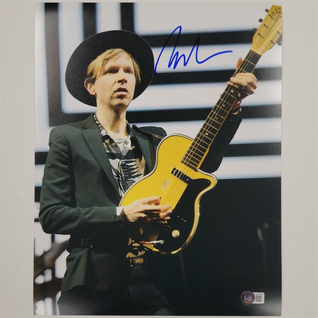 11x14 Photo Signed by Beck with Beckett BAS Authentication: 11x14 Photo Signed by Beck with Beckett BAS Authentication This is an original 11x14 photo signed by singer and musician Beck Hansen. The autograph is authenticated by Beckett and the item originates 