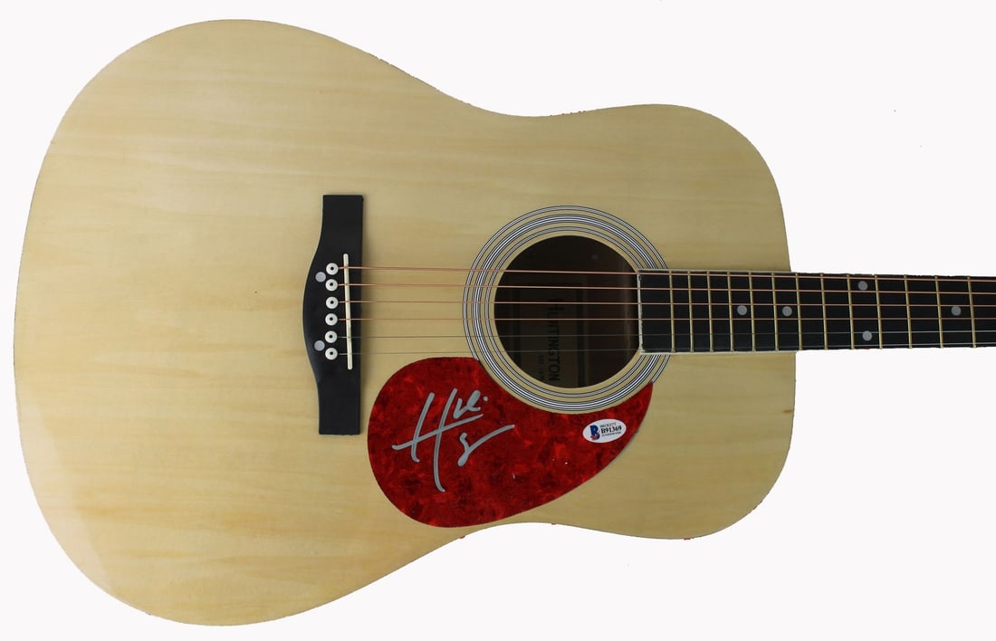 Hunter Hayes Signed Acoustic Guitar with BAS Authentication #B91369: Hunter Hayes Signed Acoustic Guitar with BAS Authentication #B91369 This is an authentic acoustic guitar personally signed by Hunter Hayes, the renowned country musician. The item comes with a Certifi