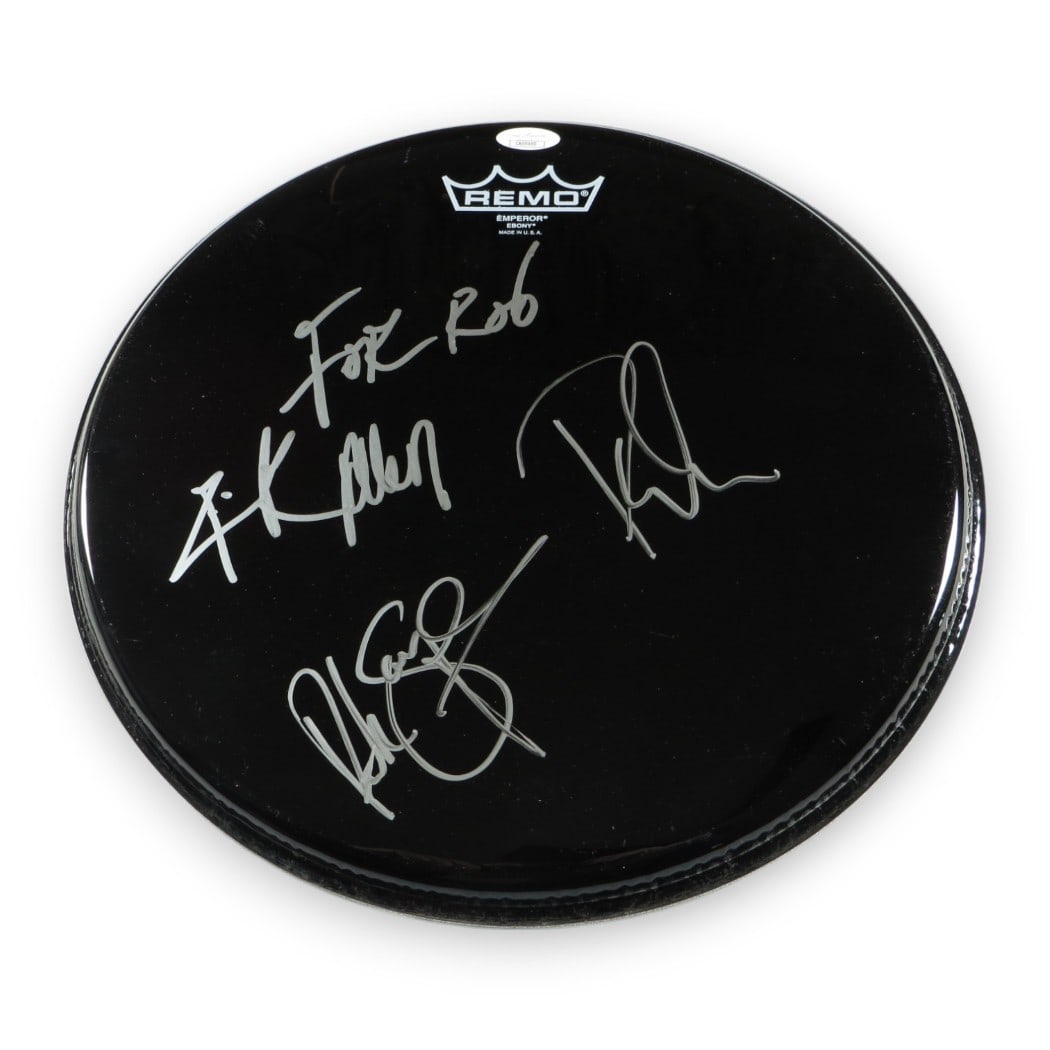 Def Leppard Autographed 12" Drumhead by Savage Collen Allen JSA: Def Leppard Autographed 12" Drumhead by Savage Collen Allen JSA This authentic 12" drumhead features the signatures of legendary Def Leppard members Rick Savage, Phil Collen, and Rick Allen. The autog
