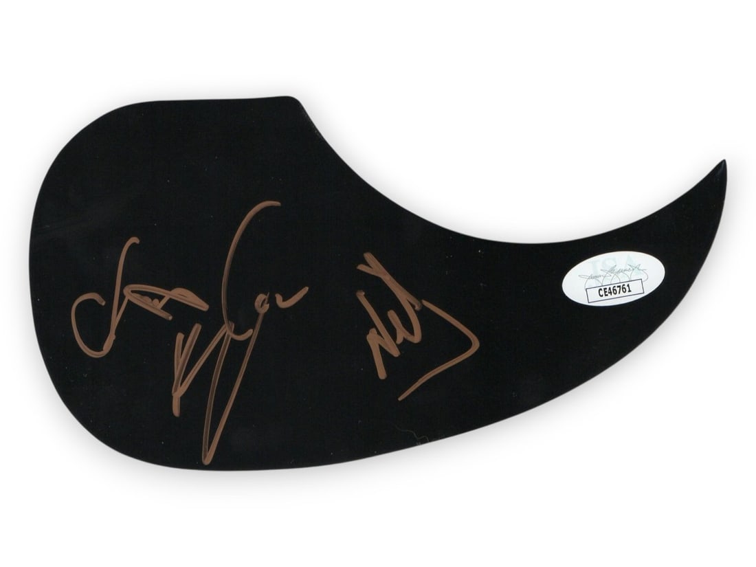 Cadillac Three Signed Guitar Pickguard Jaren Johnston Neil Mason Kelby Ray JSA: Cadillac Three Signed Guitar Pickguard Jaren Johnston Neil Mason Kelby Ray JSA This is an original, autographed guitar pickguard from The Cadillac Three band. It features the signatures of band member