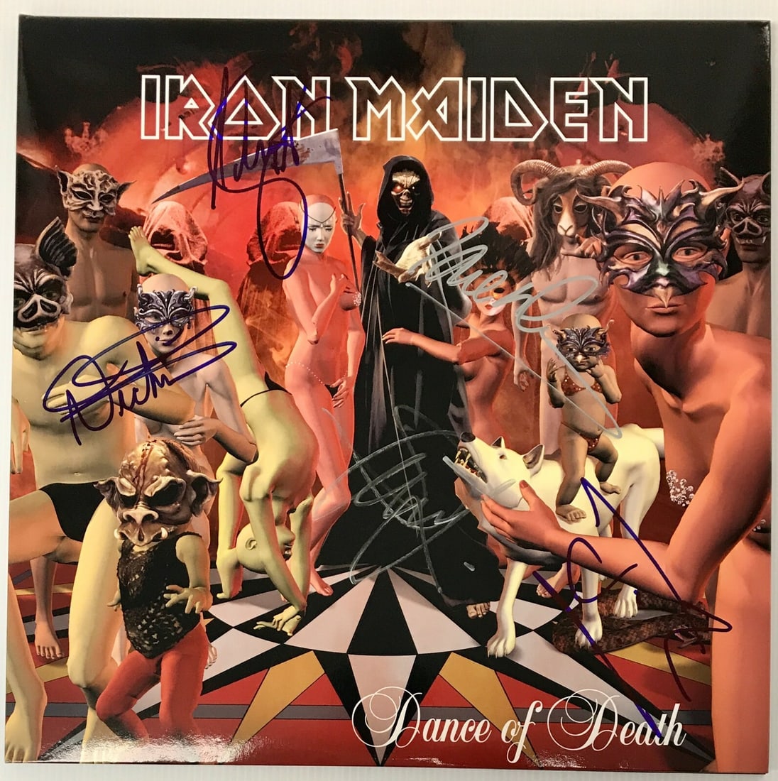 Iron Maiden Dance of Death Album Signed by 5 Members Authentic: Iron Maiden Dance of Death Album Signed by 5 Members Authentic This collectible features the Iron Maiden autographed album "Dance of Death," a must-have for any metal music fan. This original 180-gram