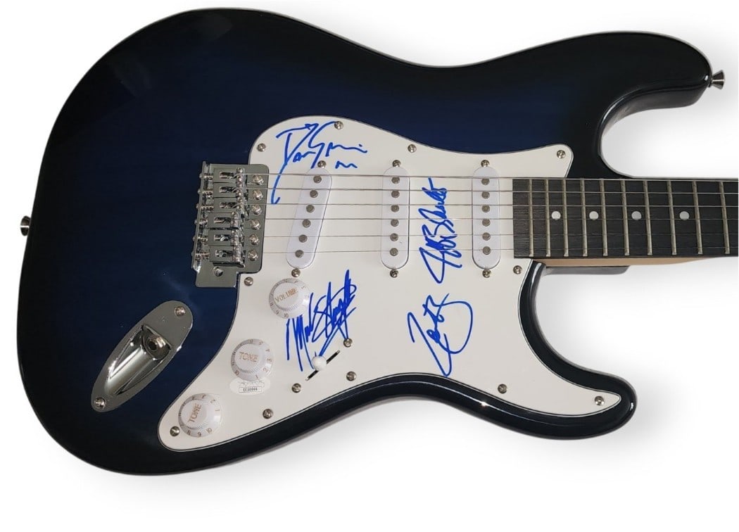 Mark Slaughter Signed Band Guitar with JSA Authentication: Mark Slaughter Signed Band Guitar with JSA Authentication This original autographed band guitar is signed by prominent members Mark Slaughter, Dana Strum, Jeff Bland, and Zoltan Chaney. The guitar com
