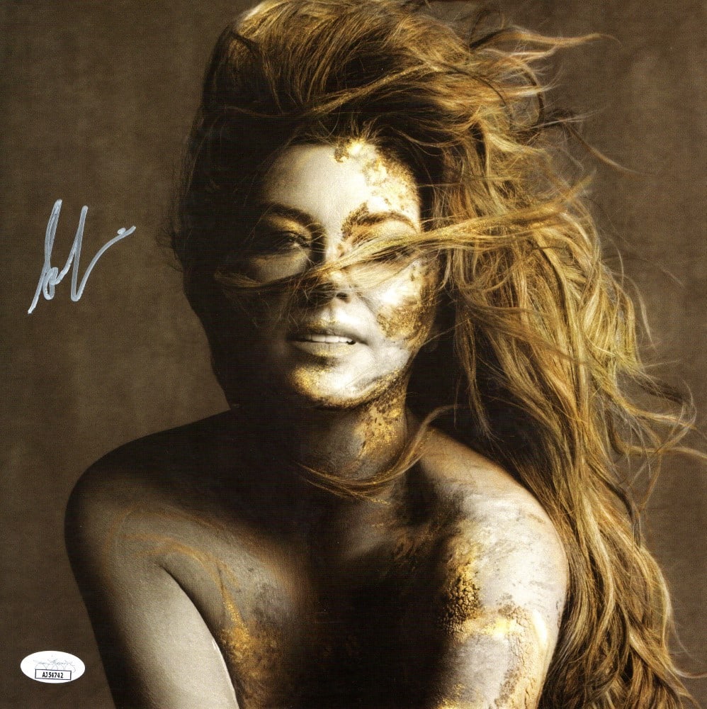 Shania Twain Signed 11X11 Album Photo JSA Authenticated: Shania Twain Signed 11X11 Album Photo JSA Authenticated This is an original 11X11 album photo autographed by the iconic Shania Twain, known for her impactful contributions to country music. The autogr