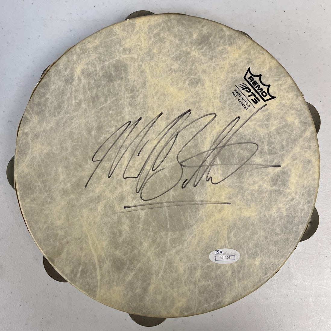 Michael Bolton Signed 10 Inch REMO Tambourine JSA I61329: Michael Bolton Signed 10 Inch REMO Tambourine JSA I61329 This 10-inch REMO tambourine is signed by pop music legend Michael Bolton, making it a fantastic collectible for fans and music enthusiasts. Th
