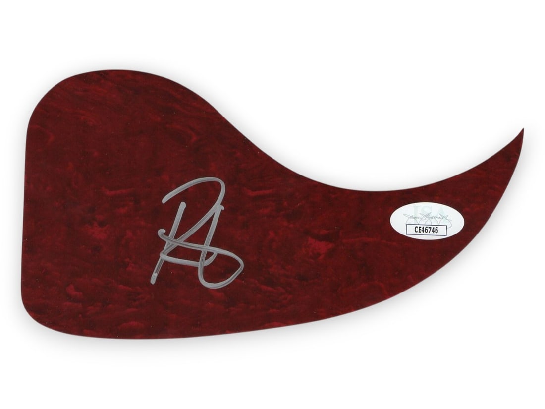 Randy Houser Autographed Guitar Pickguard JSA Certified: Randy Houser Autographed Guitar Pickguard JSA Certified Randy Houser signed acoustic guitar pickguard, perfect for any fan or collector. This pickguard features an authentic autograph from the singer-