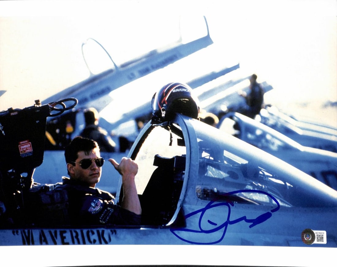 Tom Cruise autographed Top Gun 11x14 photo Beckett: Tom Cruise autographed Top Gun 11x14 photo Beckett This 11x14 photograph from the film Top Gun features Tom Cruise as U.S. Navy pilot Pete "Maverick" Mitchell, giving a thumbs-up from the cockpit. The