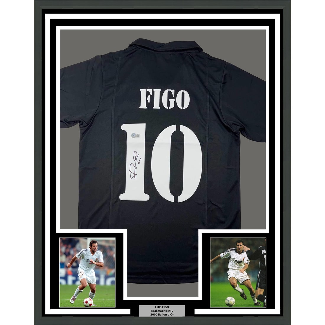 Framed Luis Figo Autographed Real Madrid Jersey 35x39 Beckett COA: Framed Luis Figo Autographed Real Madrid Jersey 35x39 Beckett COA Celebrate the legendary career of Luis Figo with this professionally framed autographed black jersey from his time at Real Madrid. Mea