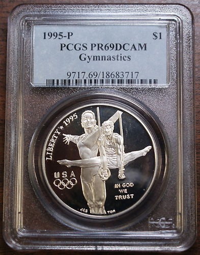 1995-P PCGS PR69 Proof Olympic Gymnastics Commemorative Silver Dollar: 1995-P PCGS PR69 Proof Olympic Gymnastics Commemorative Silver Dollar This is a 1995-P Olympic Gymnastics Commemorative Silver Dollar graded PR-69 by PCGS. The coin is a proof strike, minted in Philad
