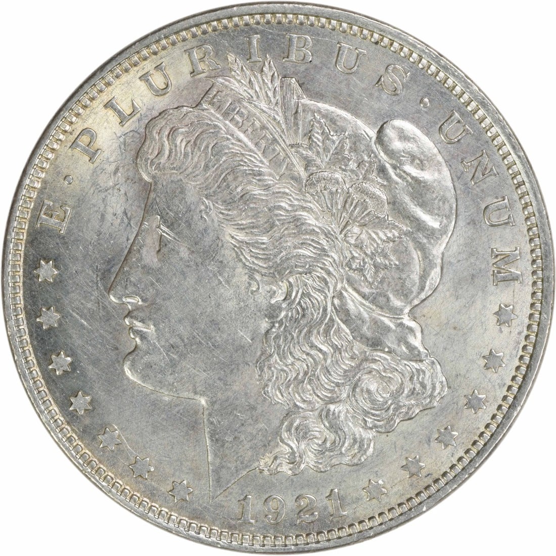 Uncirculated 1921 Morgan Silver Dollar Brilliant Uncertified No Mint Mark: Uncirculated 1921 Morgan Silver Dollar Brilliant Uncertified No Mint Mark This 1921 Morgan Silver Dollar is an uncirculated coin with brilliant uncirculated (BU) grade. It is composed of silver and wa