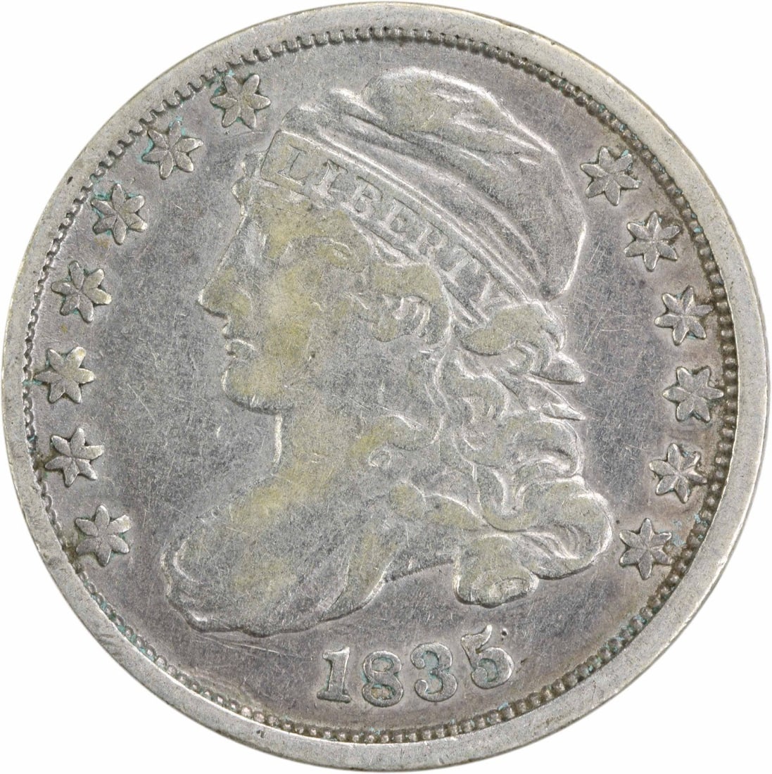 1835 Capped Bust Silver Dime 10C Philadelphia Mint Uncertified: 1835 Capped Bust Silver Dime 10C Philadelphia Mint Uncertified This 1835 Bust Silver Dime features the Capped Bust design by John Reich, showcasing a rich historical significance. It is a circulated c