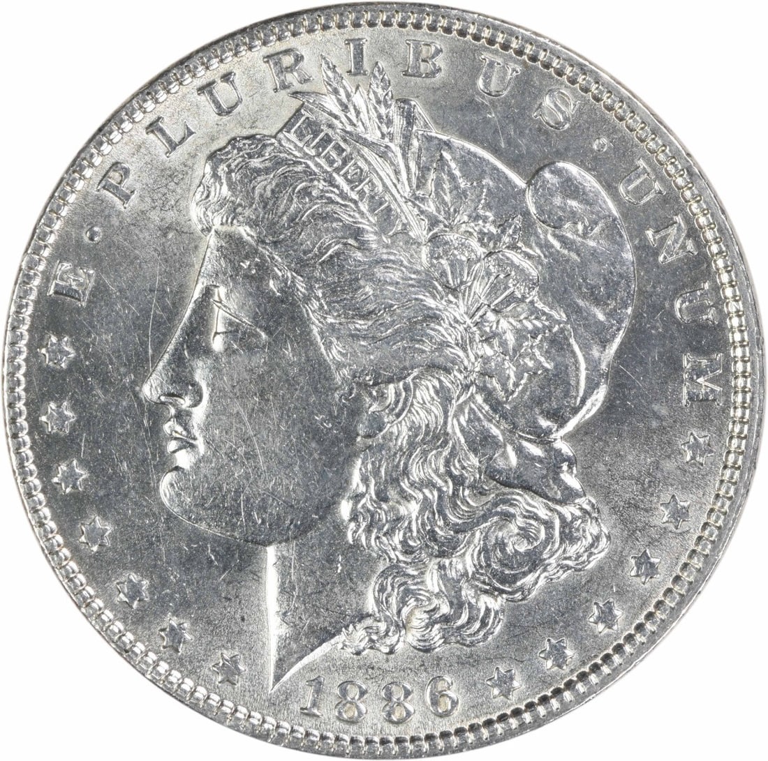 1886 Philadelphia Morgan Dollar 90% Silver AU Uncertified: 1886 Philadelphia Morgan Dollar 90% Silver AU Uncertified This 1886 Morgan Silver Dollar was struck at the Philadelphia Mint and is composed of 90% silver and 10% copper. Designed by George T. Morgan,