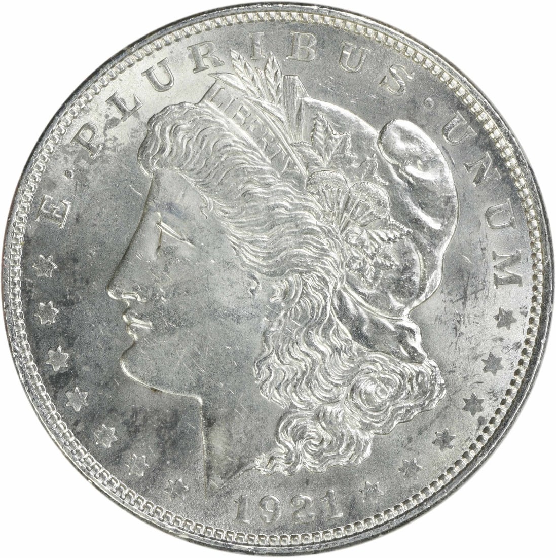 Uncirculated 1921 Silver Dollar Morgan Type BU Philadelphia No Mint Mark: Uncirculated 1921 Silver Dollar Morgan Type BU Philadelphia No Mint Mark This 1921 Morgan Silver Dollar is an uncirculated coin featuring bright uncirculated (BU) quality. Composed of silver, it is un