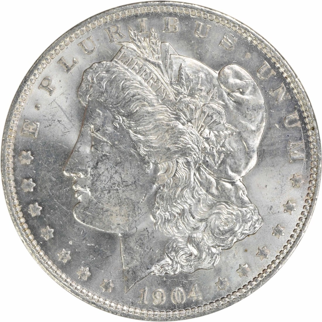 BU 1904 O Silver Dollar Morgan Uncertified Uncirculated US Coin: BU 1904 O Silver Dollar Morgan Uncertified Uncirculated US Coin This is a 1904-O Morgan Silver Dollar from the United States, featuring the New Orleans (O) mint mark. The coin is uncirculated and is c
