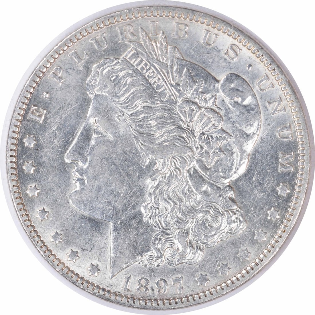 1897-O Morgan Silver Dollar AU Uncertified 90% Silver Coin: 1897-O Morgan Silver Dollar AU Uncertified 90% Silver Coin This 1897-O Morgan Silver Dollar features a beautiful design by George T. Morgan and is made of 90% silver and 10% copper. It is in an AU (Al