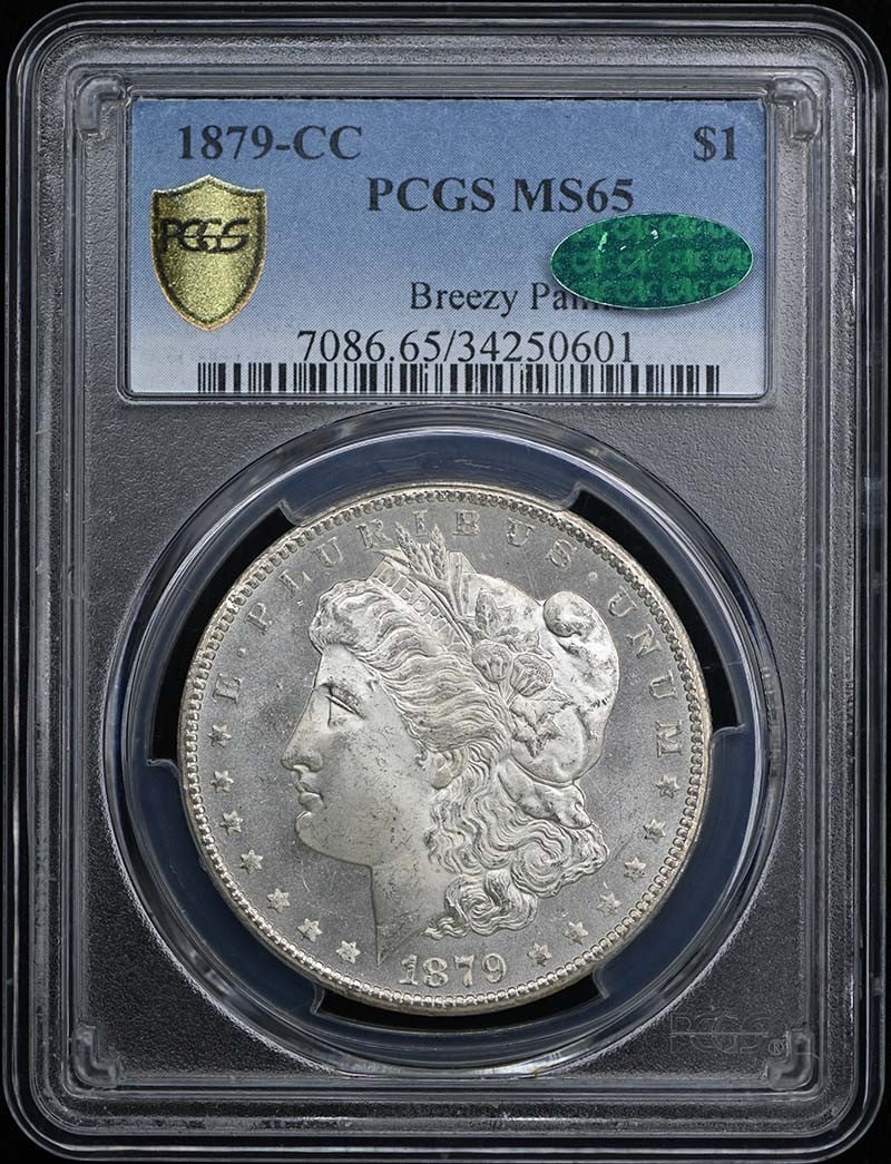 1879-CC Morgan Dollar PCGS MS65 CAC Certified Uncirculated: 1879-CC Morgan Dollar PCGS MS65 CAC Certified Uncirculated This 1879-CC Morgan Dollar is a stunning example of American coinage, graded MS65 by PCGS. It was minted in Carson City and is classified as 