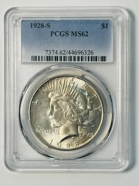 PCGS MS-62 1928-S Peace Silver Dollar: PCGS MS-62 1928-S Peace Silver Dollar This 1928 Peace Dollar was minted in San Francisco and is composed of silver. It has been professionally graded MS 62 by PCGS, indicating a Mint State coin with m