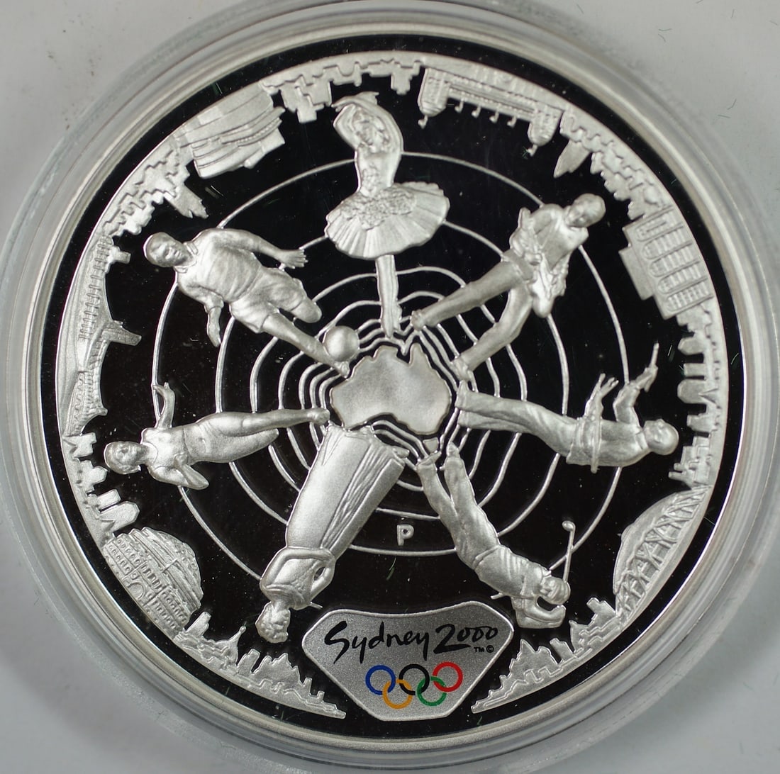 Sydney Olympics 2000 Australian $5 Silver Proof 1oz Commemorative Coin: Sydney Olympics 2000 Australian $5 Silver Proof 1oz Commemorative Coin This is a 2000 Australia $5 commemorative proof coin issued for the Sydney Olympics XXVII. Struck from 1 oz of .999 fine silver, 