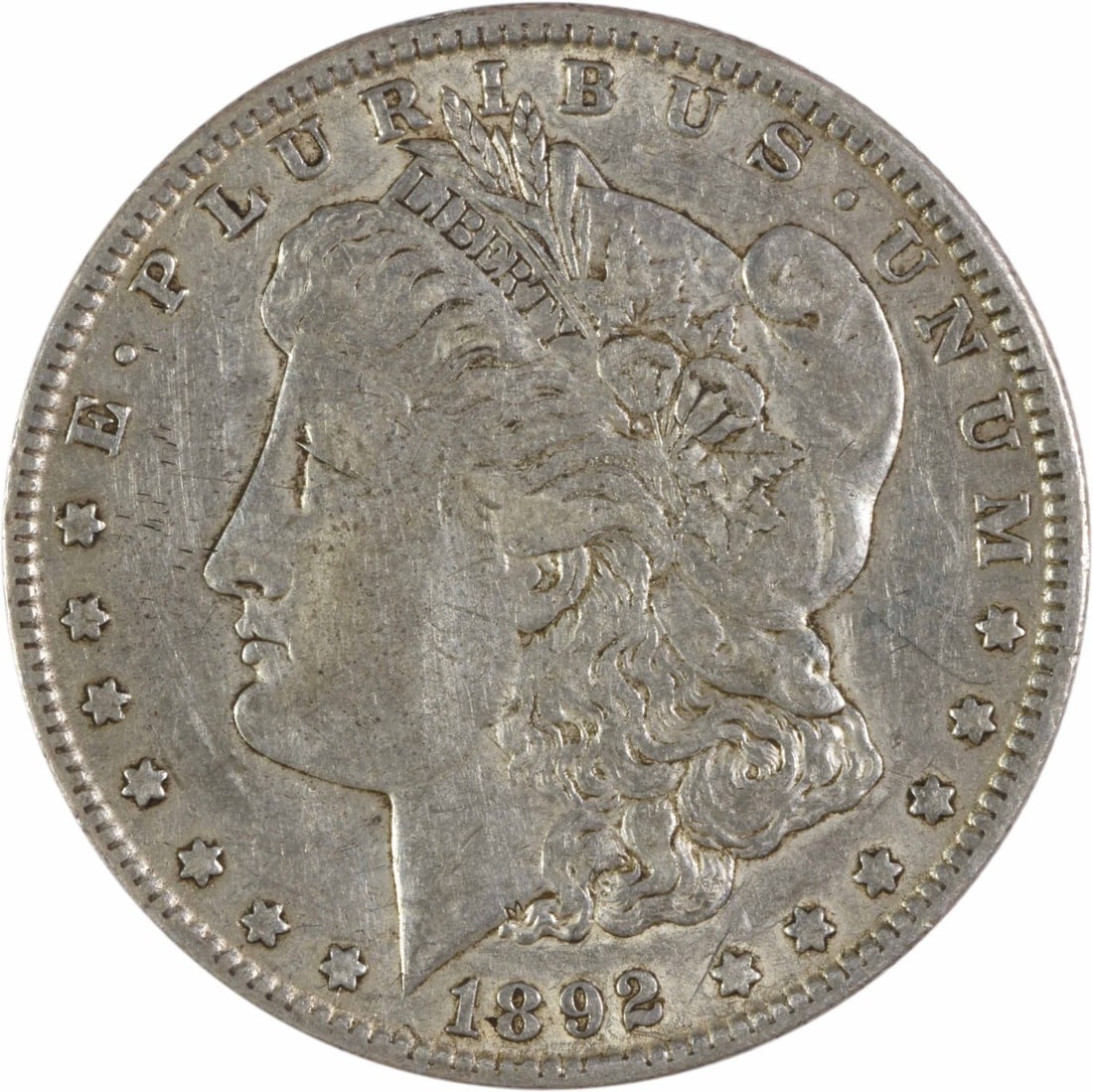 1892-O Morgan Silver Dollar EF Uncertified New Orleans Coin: 1892-O Morgan Silver Dollar EF Uncertified New Orleans Coin This 1892-O Morgan Silver Dollar is a classic piece of numismatic history, featuring the iconic design by George T. Morgan. The coin, which 