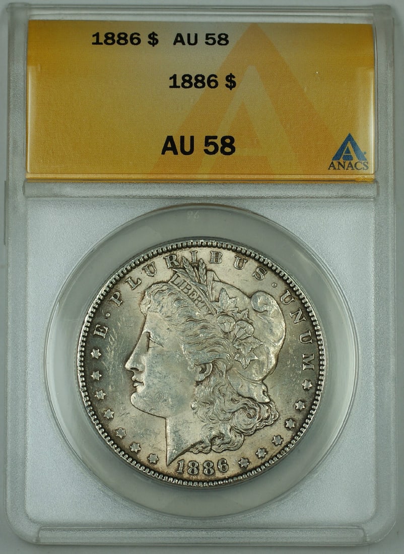 ANACS AU-58 1886 Morgan Silver Dollar Philadelphia Mint Light Toning: ANACS AU-58 1886 Morgan Silver Dollar Philadelphia Mint Light Toning This is a 1886 Morgan Silver Dollar coin graded AU-58 by ANACS. The coin has a lightly toned appearance and was minted in Philadelp