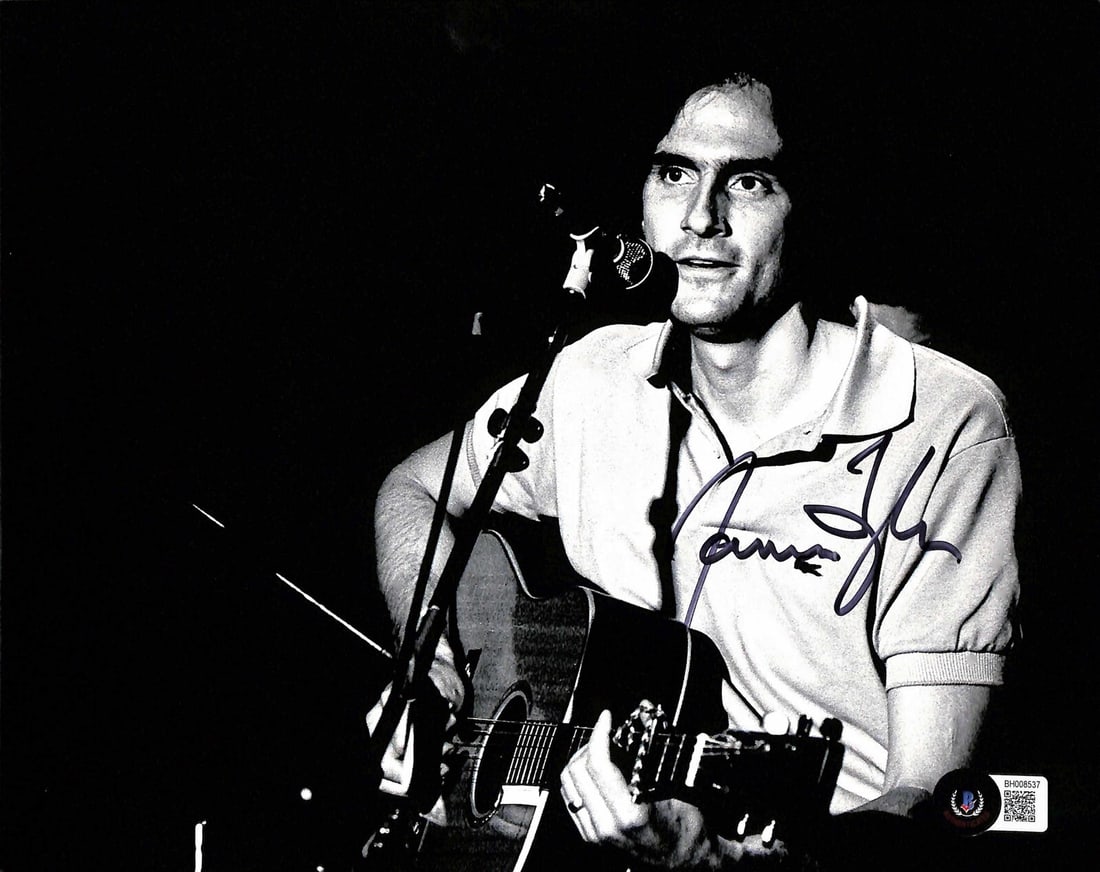 Autographed 8x10 Photo of James Taylor with Beckett Authentication: Autographed 8x10 Photo of James Taylor with Beckett Authentication This is an original 8x10 photograph autographed by folk music legend James Taylor in black permanent marker. The autograph is certifi