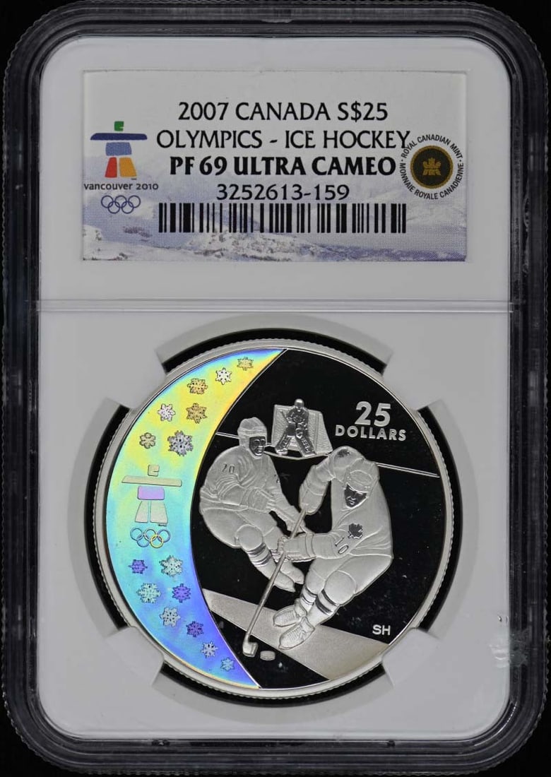 Canada 2007 Olympic Ice Hockey S25 NGC PR69DCAM: Canada 2007 Olympic Ice Hockey S25 NGC PR69DCAM This 2007 Canada $25 coin commemorates the Olympics and features an ice hockey theme. Graded PR69 Deep Cameo by NGC, the coin is uncirculated and comes 