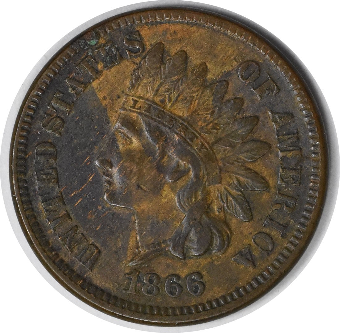 1866 Indian Head Small Cent Copper EF Uncertified: 1866 Indian Head Small Cent Copper EF Uncertified This is an 1866 Indian Head Cent, featuring the classic Native American headdress design. The coin is circulated and graded as Extremely Fine (EF). It